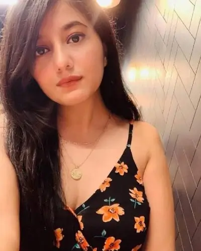Well-dressed woman at a party in Dehradun